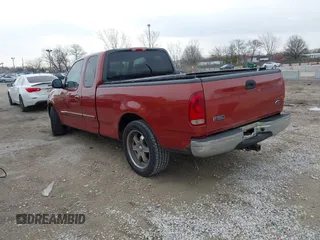 2001 Ford F-150 XL z VIN 1FTRX17W61NA63398, wystawiony jako IAAI lot #41882852 z przebiegiem 179 573 mil mil oraz . Historia ofert i sprzedaży dostępna na DreamBid. Obrazek 3.