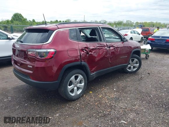 2021 Jeep Compass Latitude with VIN 3C4NJDBBXMT504993, listed as a IAAI auction lot 42181872 with 56,053 mi miles and . Bid and sale history available at DreamBid. Image 4.
