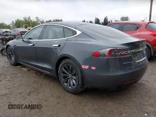2017 Tesla Model S 100D with VIN 5YJSA1E26HF224568, listed as a IAAI auction lot 42140201 with 102,403 mi miles. Bid and sale history available at carsss.com. Image 3.