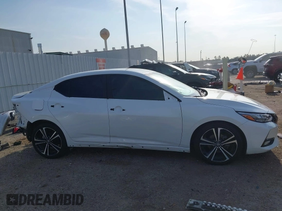 2021 Nissan Sentra SR z VIN 3N1AB8DV8MY248742, wystawiony jako IAAI lot #42034660 z przebiegiem 47 801 mil mil oraz . Historia ofert i sprzedaży dostępna na DreamBid. Obrazek 14.