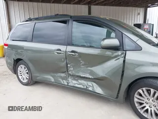 2012 Toyota Sienna XLE AAS z VIN 5TDYK3DC0CS275646, wystawiony jako IAAI lot #42116979 z przebiegiem 250 909 mil mil oraz . Historia ofert i sprzedaży dostępna na DreamBid. Obrazek 6.