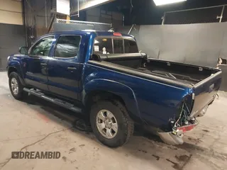 2014 Toyota Tacoma with VIN 3TMLU4EN4EM156933, listed as a IAAI auction lot 41197904 with 128,183 mi miles. Bid and sale history available at carsss.com. Image 3.
