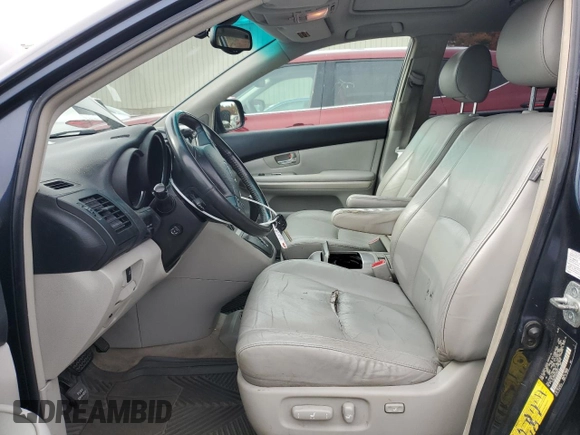 2006 Lexus RX 400h with VIN JTJHW31U462004213, listed as a Copart auction lot 78657944 with 202,326 mi miles and Salvage title. Bid and sale history available at DreamBid. Image 7.