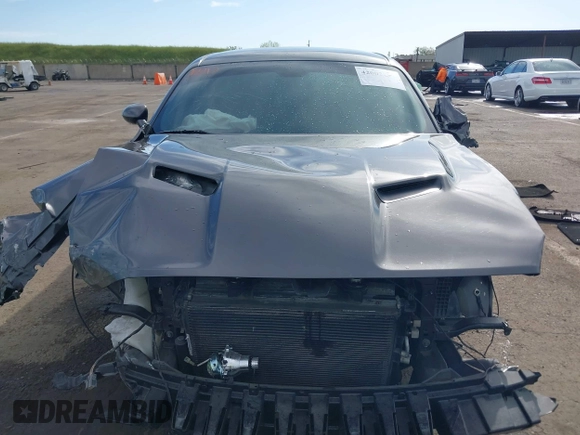2019 Dodge Challenger SXT z VIN 2C3CDZAG8KH666463, wystawiony jako IAAI lot #42002571 z przebiegiem 78 629 mil mil oraz . Historia ofert i sprzedaży dostępna na DreamBid. Obrazek 12.
