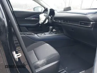 2021 Mazda CX-30 S with VIN 3MVDMBAL2MM265207, listed as a IAAI auction lot 41566325 with 62,587 mi miles and . Bid and sale history available at carsss.com. Image 5.