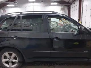 2008 BMW X5 3.0si with VIN 5UXFE43528L001685, listed as a IAAI auction lot 41890395 with 189,724 mi miles. Bid and sale history available at carsss.com. Image 13.