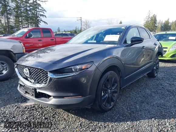 2021 Mazda CX-30 Premium with VIN 3MVDMBDY2MM239231, listed as a IAAI auction lot 41655159 with 22,679 mi miles and . Bid and sale history available at carsss.com. Image 18.