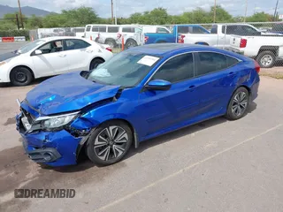 2018 Honda Civic EX-T z VIN JHMFC1F31JX018152, wystawiony jako IAAI lot #41935394 z przebiegiem 60 333 mil mil oraz . Historia ofert i sprzedaży dostępna na DreamBid. Obrazek 17.