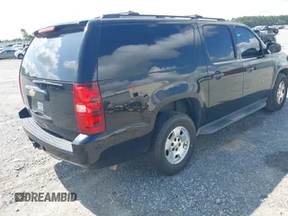 2013 Chevrolet Suburban LT with VIN 1GNSCJE03DR121628, listed as a IAAI auction lot 42629432 with 223,761 mi miles and . Bid and sale history available at DreamBid. Image 4.