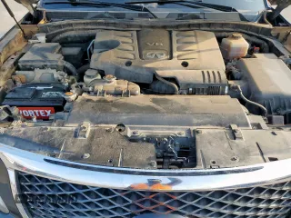 2015 Infiniti QX80 z VIN JN8AZ2NF3F9572269, wystawiony jako Copart lot #59090505 z przebiegiem 202 965 mil mil oraz Czysty tytuł • Clean title. Historia ofert i sprzedaży dostępna na DreamBid. Obrazek 11.