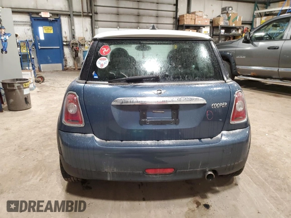 2010 MINI Hardtop z VIN WMWMF3C55ATZ67130, wystawiony jako Copart lot #51225575 z przebiegiem 200 279 mil mil oraz Szkoda całkowita • Salvage title. Historia ofert i sprzedaży dostępna na DreamBid. Obrazek 6.