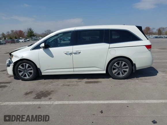 2016 Honda Odyssey Touring Elite with VIN 5FNRL5H97GB044278, listed as a IAAI auction lot 42056101 with 182,396 mi miles and . Bid and sale history available at DreamBid. Image 14.