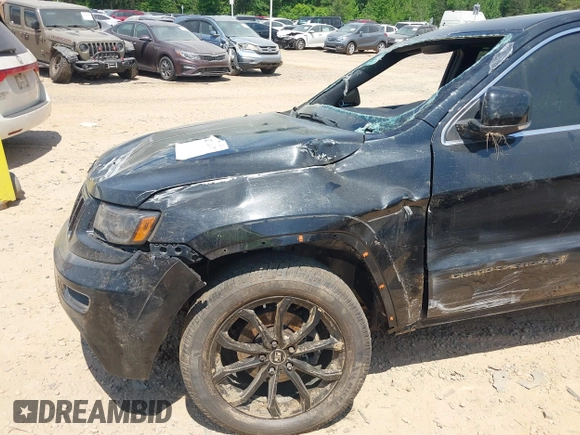 2016 Jeep Grand Cherokee Overland with VIN 1C4RJFCG5GC408390, listed as a IAAI auction lot 42140038 with 140,507 mi miles and . Bid and sale history available at DreamBid. Image 6.