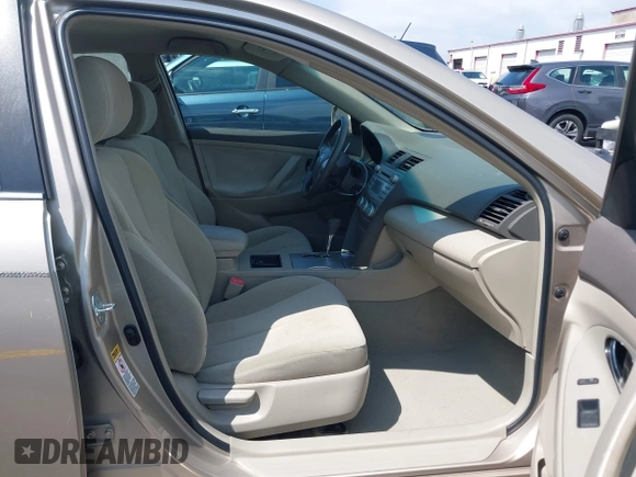 2007 Toyota Camry CE with VIN 4T1BE46KX7U716414, listed as a IAAI auction lot 42116250 with 104,298 mi miles and . Bid and sale history available at DreamBid. Image 5.