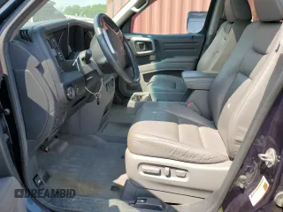 2010 Honda Ridgeline RTL with VIN 5FPYK1F5XAB004153, listed as a Copart auction lot 59710535 with Not provided miles and Salvage title. Bid and sale history available at DreamBid. Image 7.