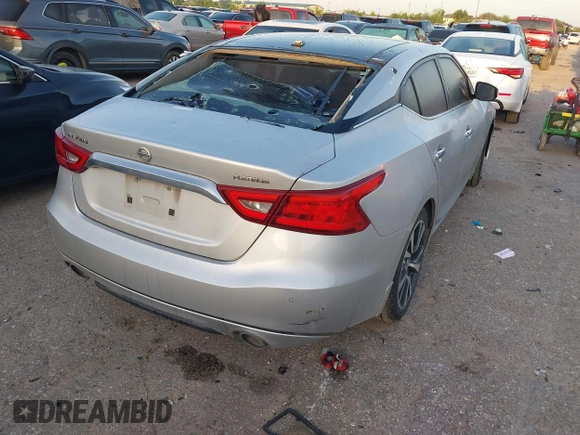 2016 Nissan Maxima SR z VIN 1N4AA6AP9GC382348, wystawiony jako IAAI lot #42012121 z przebiegiem 203 513 mil mil oraz . Historia ofert i sprzedaży dostępna na DreamBid. Obrazek 4.