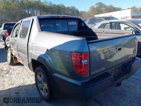 2010 Honda Ridgeline RTL with VIN 5FPYK1F52AB004678, listed as a IAAI auction lot 41661968 with 169,021 mi miles. Bid and sale history available at carsss.com. Image 3.