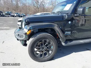 2023 Jeep Wrangler 4xe Sahara with VIN 1C4JJXP62PW613040, listed as a IAAI auction lot 41489171 with 36,818 mi miles. Bid and sale history available at carsss.com. Image 18.