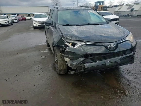 2018 Toyota RAV4 LE with VIN 2T3BFREV3JW787927, listed as a Copart auction lot 46825865 with 103,584 mi miles and Salvage Title. Bid and sale history available at carsss.com. Image 12.
