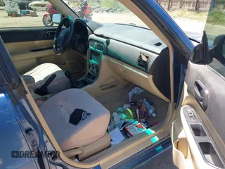 2007 Subaru Forester X with VIN JF1SG63627G718079, listed as a IAAI auction lot 42290134 with 303,089 mi miles and . Bid and sale history available at DreamBid. Image 5.