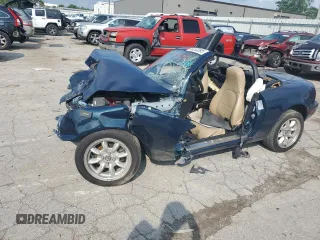 1996 Mazda MX-5 Miata with VIN JM1NA3537T0709942, listed as a Copart auction lot 60203395 with 93,296 mi miles and Salvage title. Bid and sale history available at DreamBid. Image 1.