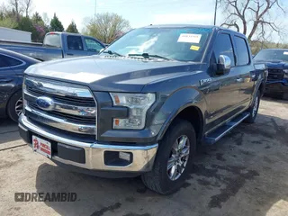 2015 Ford F-150 XL with VIN 1FTEW1CGXFFA33502, listed as a IAAI auction lot 41833755 with 128,475 mi miles. Bid and sale history available at carsss.com. Image 2.