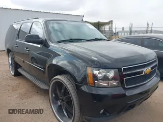 2007 Chevrolet Suburban LS with VIN 1GNFC16J47R261393, listed as a IAAI auction lot 41422841 with 147,450 mi miles and . Bid and sale history available at DreamBid. Image 1.