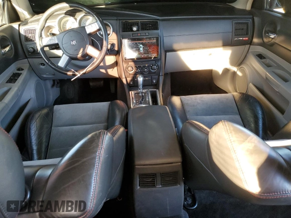 2006 Dodge Charger SRT-8 with VIN 2B3LA73W76H336981, listed as a Copart auction lot 41524535 with 102,915 mi miles and Salvage Title. Bid and sale history available at DreamBid. Image 8.