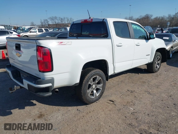2019 Chevrolet Colorado 4WD Z71 z VIN 1GCGTDEN9K1135489, wystawiony jako IAAI lot #41752283 z przebiegiem 180 854 mil mil oraz . Historia ofert i sprzedaży dostępna na DreamBid. Obrazek 4.