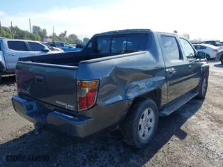 2007 Honda Ridgeline RTL w/Leather with VIN 2HJYK16537H523732, listed as a IAAI auction lot 41798931 with 219,881 mi miles. Bid and sale history available at carsss.com. Image 4.