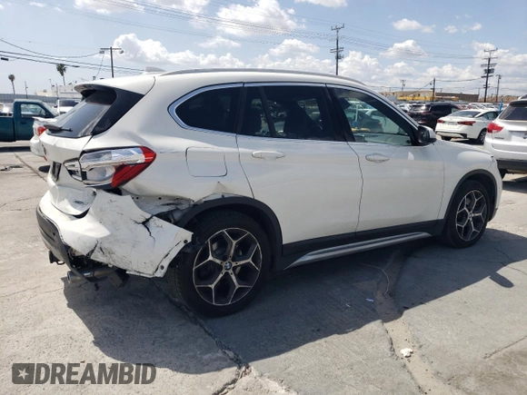 2018 BMW X1 xDrive28i with VIN WBXHT3C35J5L26952, listed as a Copart auction lot 51715035 with 63,306 mi miles and Salvage Title. Bid and sale history available at carsss.com. Image 3.
