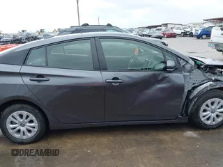 2022 Toyota Prius L Eco with VIN JTDKAMFU4N3183352, listed as a IAAI auction lot 42170623 with 52,244 mi miles and . Bid and sale history available at DreamBid. Image 14.