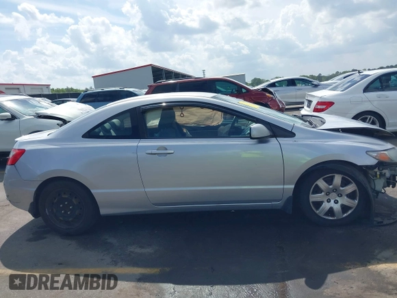 2010 Honda Civic Cpe LX with VIN 2HGFG1B68AH530485, listed as a IAAI auction lot 41907809 with 275,653 mi miles. Bid and sale history available at carsss.com. Image 13.