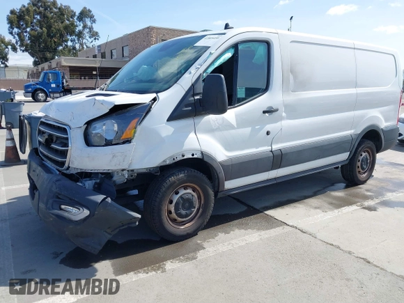 2020 Ford Transit Cargo with VIN 1FTBR1Y80LKA67205, listed as a IAAI auction lot 41805459 with 184,186 mi miles and . Bid and sale history available at DreamBid. Image 17.