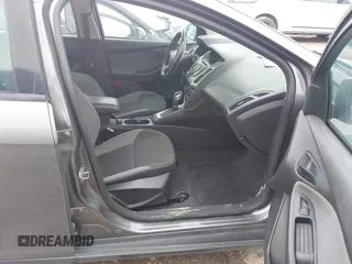 2012 Ford Focus SE z VIN 1FAHP3F2XCL430734, wystawiony jako IAAI lot #42469084 z przebiegiem 128 168 mil mil oraz . Historia ofert i sprzedaży dostępna na DreamBid. Obrazek 5.