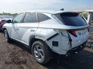 2022 Hyundai Tucson SE z VIN 5NMJACAE3NH012650, wystawiony jako IAAI lot #42137835 z przebiegiem 107 599 mil mil oraz . Historia ofert i sprzedaży dostępna na DreamBid. Obrazek 3.