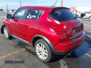 2013 Nissan Juke S with VIN JN8AF5MR5DT221143, listed as a IAAI auction lot 41149553 with 50,377 mi miles. Bid and sale history available at carsss.com. Image 3.