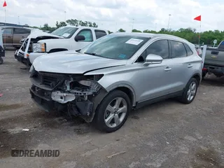 2018 Lincoln MKC Premiere with VIN 5LMCJ1C94JUL08589, listed as a IAAI auction lot 42133449 with 90,827 mi miles and . Bid and sale history available at DreamBid. Image 2.
