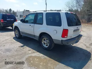 2002 Ford Explorer Sport Value z VIN 1FMYU60E62UD21697, wystawiony jako IAAI lot #42045381 z przebiegiem 122 286 mil mil oraz . Historia ofert i sprzedaży dostępna na DreamBid. Obrazek 3.