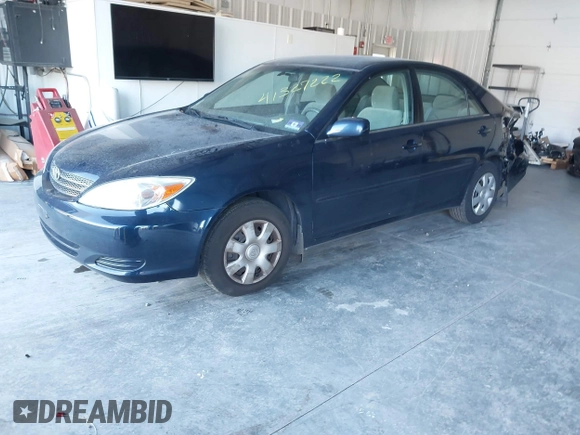 2004 Toyota Camry LE with VIN 4T1BE32K44U361333, listed as a IAAI auction lot 41327222 with 76,314 mi miles and . Bid and sale history available at carsss.com. Image 2.