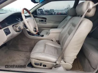 2001 Cadillac Eldorado Touring ETC z VIN 1G6ET12921B103685, wystawiony jako Copart lot #84565144 z przebiegiem 99 265 mil mil oraz Szkoda całkowita • Salvage title. Historia ofert i sprzedaży dostępna na DreamBid. Obrazek 7.