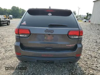 2017 Jeep Grand Cherokee Trailhawk with VIN 1C4RJFLT3HC614449, listed as a Copart auction lot 58559335 with 153,051 mi miles and Salvage title. Bid and sale history available at DreamBid. Image 6.