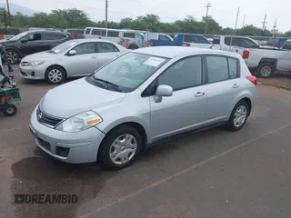 2010 Nissan Versa S with VIN 3N1BC1CP3AL401077, listed as a IAAI auction lot 41948146 with 98,394 mi miles and . Bid and sale history available at DreamBid. Image 2.