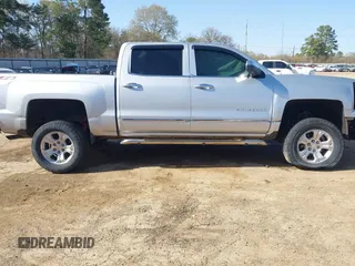 2015 Chevrolet Silverado 1500 LTZ with VIN 3GCUKSEC6FG171415, listed as a IAAI auction lot 41811018 with 171,295 mi miles and . Bid and sale history available at DreamBid. Image 14.