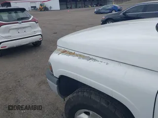 1996 Dodge 1500 z VIN 1B7HC16Y7TS692599, wystawiony jako IAAI lot #41897126 z przebiegiem 113 562 mil mil oraz . Historia ofert i sprzedaży dostępna na DreamBid. Obrazek 14.