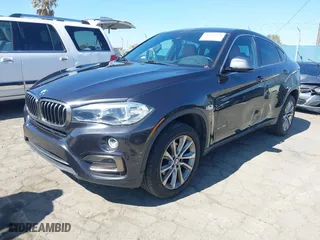 2017 BMW X6 sDrive35i with VIN 5UXKU0C34H0G69291, listed as a IAAI auction lot 41670871 with 73,977 mi miles. Bid and sale history available at carsss.com. Image 17.