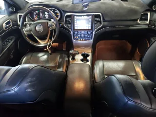2014 Jeep Grand Cherokee Summit with VIN 1C4RJFJG5EC388545, listed as a Copart auction lot 68284754 with 189,897 mi miles and Salvage Title. Bid and sale history available at carsss.com. Image 8.