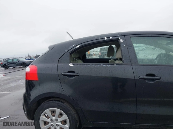 2013 Kia Rio LX with VIN KNADM5A35D6302623, listed as a IAAI auction lot 41626083 with 114,132 mi miles. Bid and sale history available at carsss.com. Image 6.