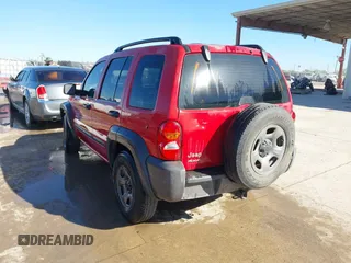 2004 Jeep Liberty Sport with VIN 1J4GL48KX4W108352, listed as a IAAI auction lot 41728648 with 162,132 mi miles. Bid and sale history available at carsss.com. Image 3.