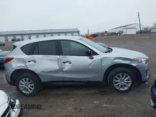 2016 Mazda CX-5 Sport with VIN JM3KE2BY5G0647715, listed as a IAAI auction lot 41831228 with 89,689 mi miles and . Bid and sale history available at carsss.com. Image 13.